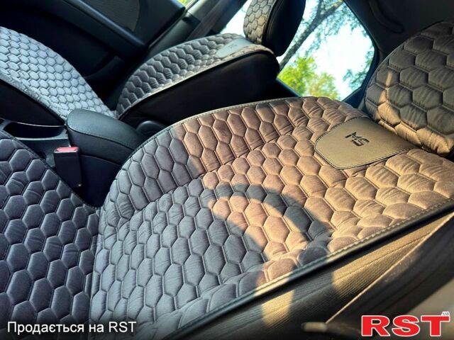 Сірий Кіа Sportage, об'ємом двигуна 2 л та пробігом 160 тис. км за 7700 $, фото 4 на Automoto.ua