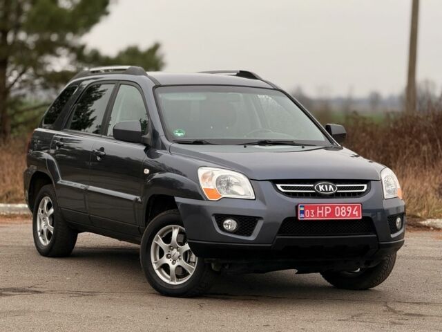 Серый Киа Sportage, объемом двигателя 2 л и пробегом 228 тыс. км за 8600 $, фото 2 на Automoto.ua