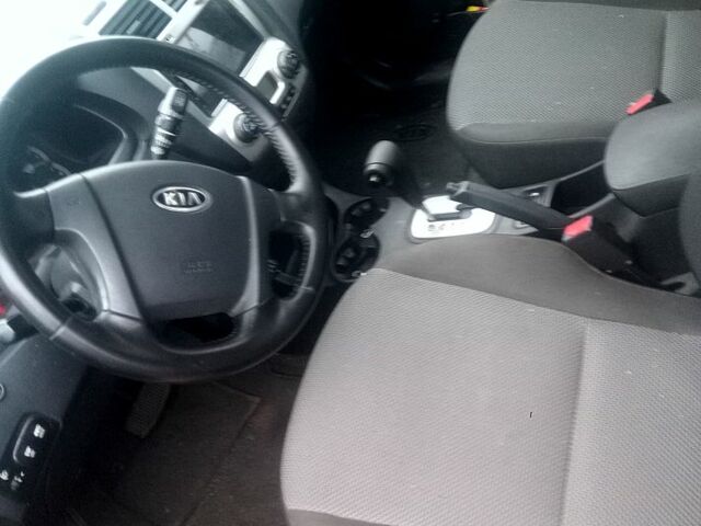 Серый Киа Sportage, объемом двигателя 2 л и пробегом 246 тыс. км за 8000 $, фото 1 на Automoto.ua