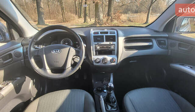 Сірий Кіа Sportage, об'ємом двигуна 2 л та пробігом 199 тис. км за 8690 $, фото 13 на Automoto.ua