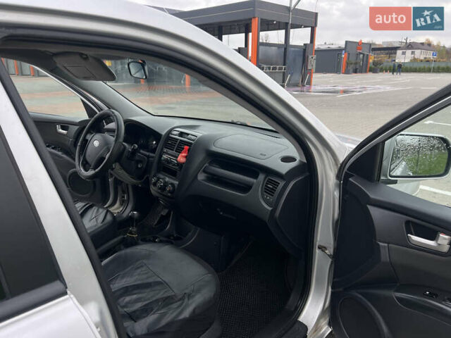 Серый Киа Sportage, объемом двигателя 1.99 л и пробегом 230 тыс. км за 8000 $, фото 19 на Automoto.ua
