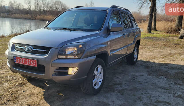 Сірий Кіа Sportage, об'ємом двигуна 2 л та пробігом 199 тис. км за 8690 $, фото 1 на Automoto.ua