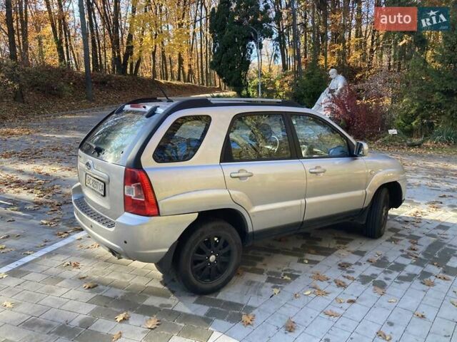 Серый Киа Sportage, объемом двигателя 2 л и пробегом 118 тыс. км за 7800 $, фото 2 на Automoto.ua