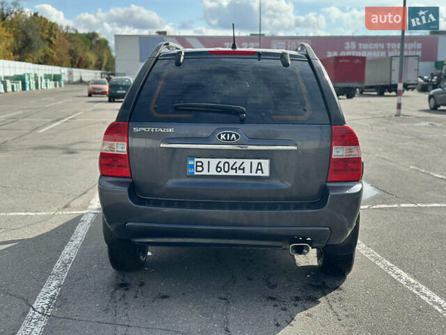 Серый Киа Sportage, объемом двигателя 2 л и пробегом 250 тыс. км за 7500 $, фото 4 на Automoto.ua