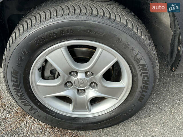 Серый Киа Sportage, объемом двигателя 2 л и пробегом 167 тыс. км за 7600 $, фото 12 на Automoto.ua