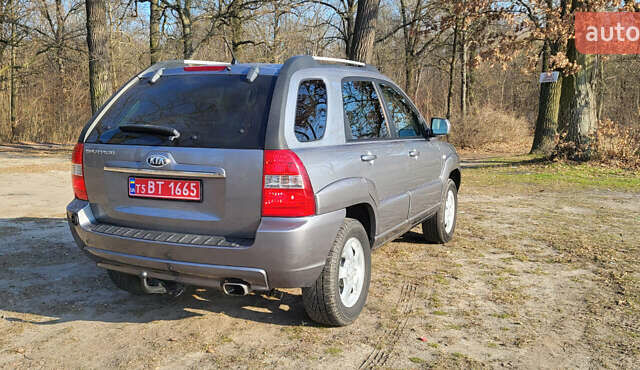 Сірий Кіа Sportage, об'ємом двигуна 2 л та пробігом 199 тис. км за 8690 $, фото 5 на Automoto.ua