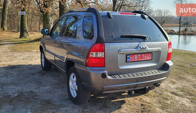 Сірий Кіа Sportage, об'ємом двигуна 2 л та пробігом 199 тис. км за 8690 $, фото 4 на Automoto.ua