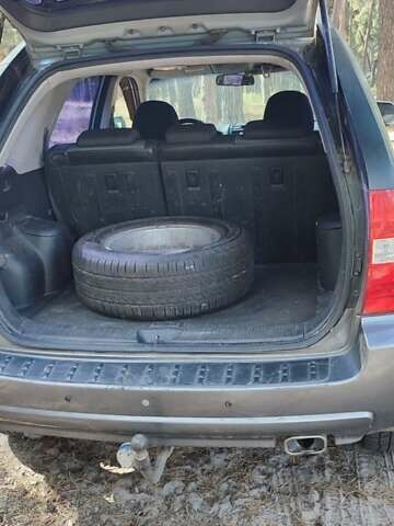 Сірий Кіа Sportage, об'ємом двигуна 2 л та пробігом 167 тис. км за 6700 $, фото 26 на Automoto.ua
