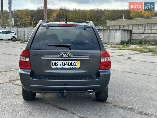 Серый Киа Sportage, объемом двигателя 2 л и пробегом 167 тыс. км за 7600 $, фото 9 на Automoto.ua