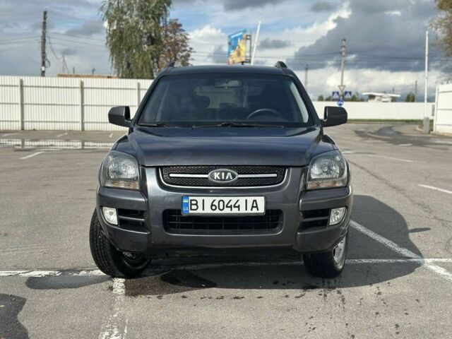 Серый Киа Sportage, объемом двигателя 2 л и пробегом 250 тыс. км за 7500 $, фото 1 на Automoto.ua