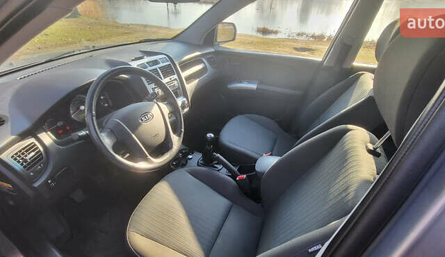 Сірий Кіа Sportage, об'ємом двигуна 2 л та пробігом 199 тис. км за 8690 $, фото 16 на Automoto.ua