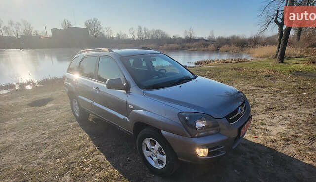 Сірий Кіа Sportage, об'ємом двигуна 2 л та пробігом 199 тис. км за 8690 $, фото 22 на Automoto.ua