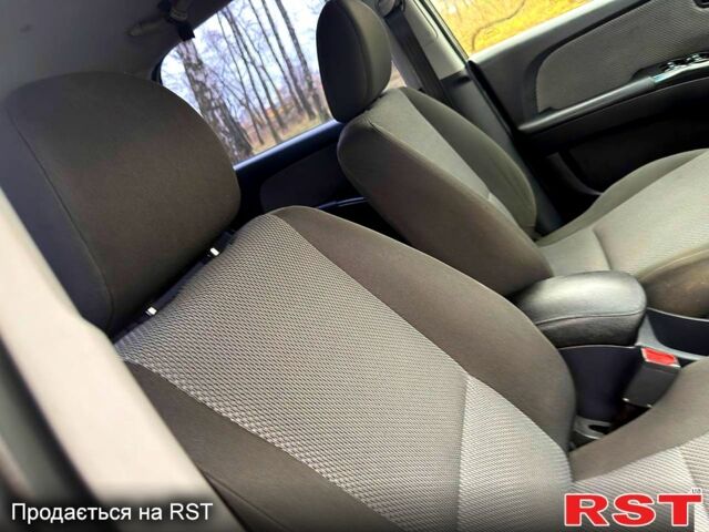 Серый Киа Sportage, объемом двигателя 2 л и пробегом 165 тыс. км за 7490 $, фото 9 на Automoto.ua