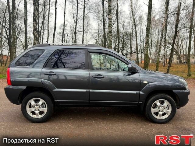 Серый Киа Sportage, объемом двигателя 2 л и пробегом 165 тыс. км за 7490 $, фото 3 на Automoto.ua