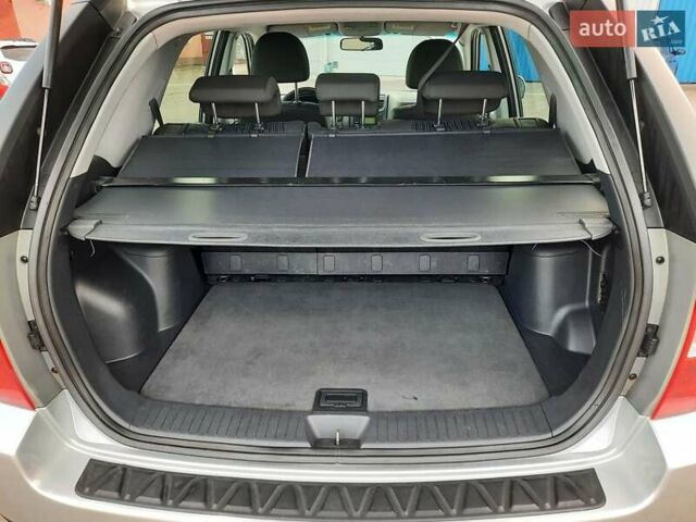 Серый Киа Sportage, объемом двигателя 2 л и пробегом 186 тыс. км за 9100 $, фото 110 на Automoto.ua