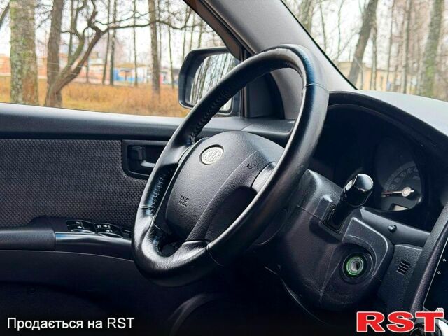 Серый Киа Sportage, объемом двигателя 2 л и пробегом 165 тыс. км за 7490 $, фото 10 на Automoto.ua