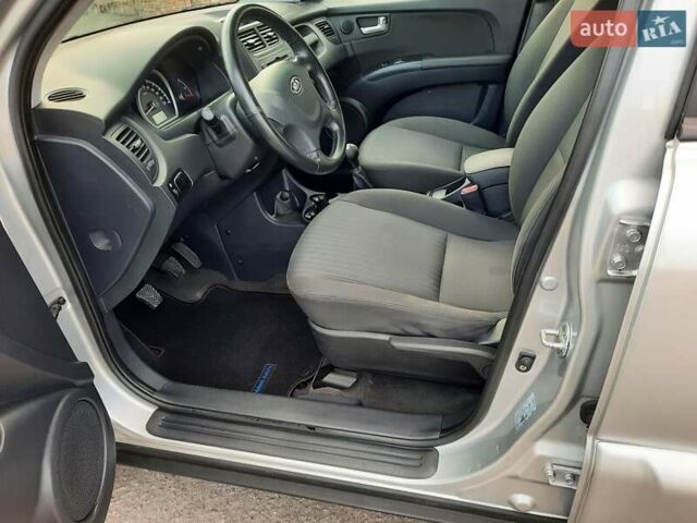 Серый Киа Sportage, объемом двигателя 2 л и пробегом 186 тыс. км за 9100 $, фото 43 на Automoto.ua