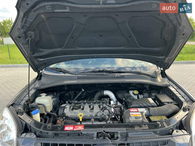 Серый Киа Sportage, объемом двигателя 1.99 л и пробегом 270 тыс. км за 9000 $, фото 17 на Automoto.ua