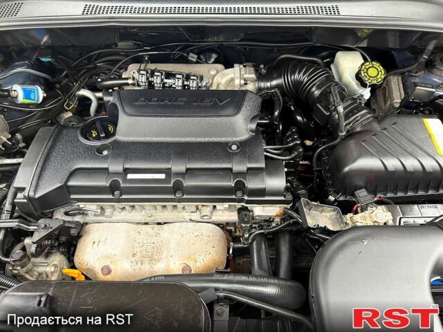 Серый Киа Sportage, объемом двигателя 2 л и пробегом 165 тыс. км за 7490 $, фото 12 на Automoto.ua