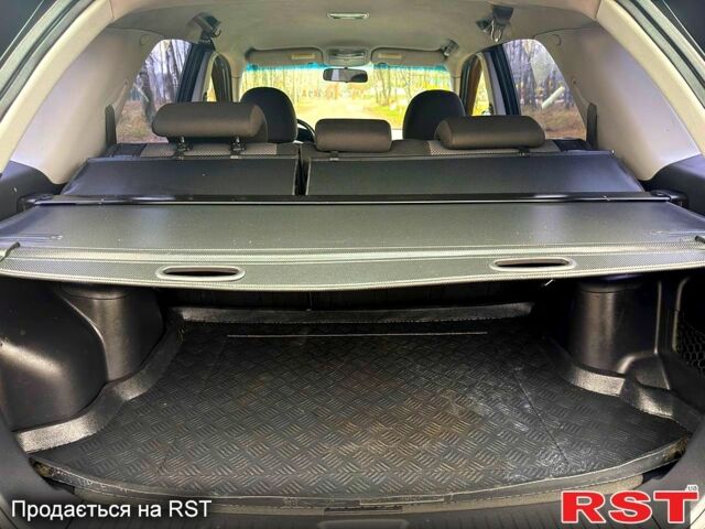 Серый Киа Sportage, объемом двигателя 2 л и пробегом 165 тыс. км за 7490 $, фото 7 на Automoto.ua