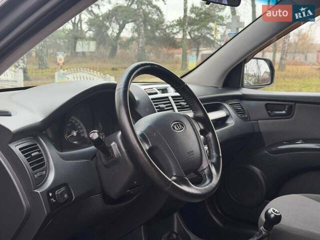 Серый Киа Sportage, объемом двигателя 2 л и пробегом 165 тыс. км за 7490 $, фото 12 на Automoto.ua