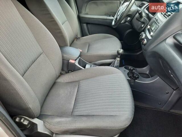 Серый Киа Sportage, объемом двигателя 2 л и пробегом 186 тыс. км за 9100 $, фото 128 на Automoto.ua