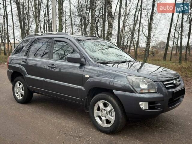 Серый Киа Sportage, объемом двигателя 2 л и пробегом 165 тыс. км за 7490 $, фото 3 на Automoto.ua