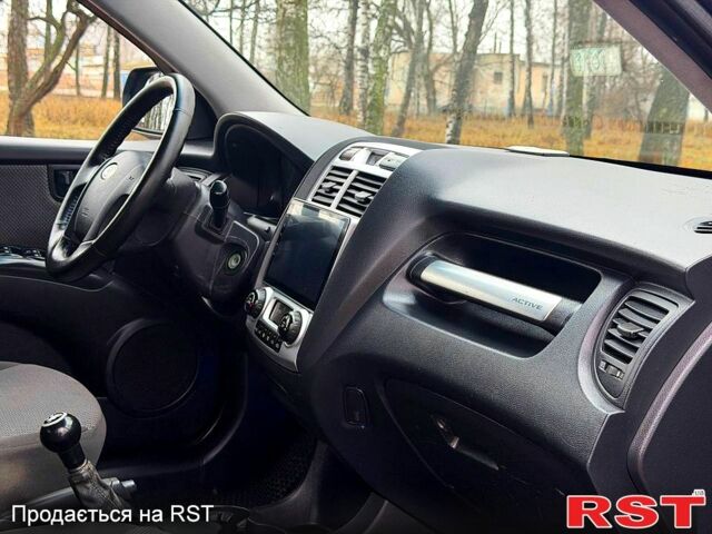 Серый Киа Sportage, объемом двигателя 2 л и пробегом 165 тыс. км за 7490 $, фото 8 на Automoto.ua