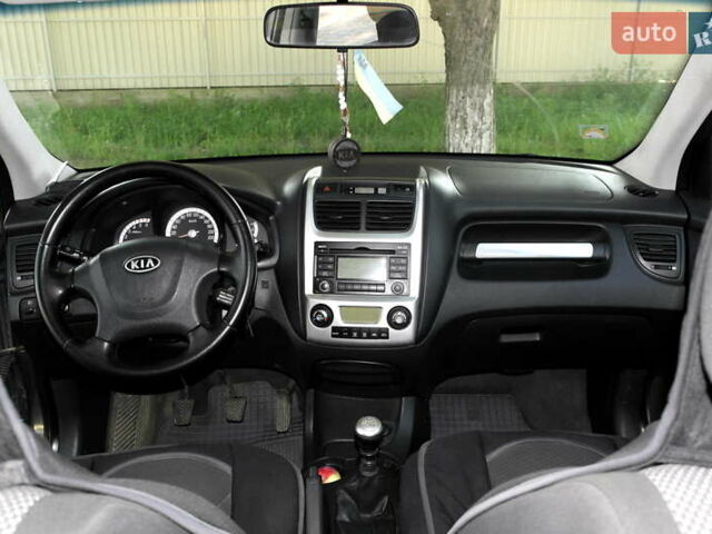 Серый Киа Sportage, объемом двигателя 1.99 л и пробегом 234 тыс. км за 9800 $, фото 11 на Automoto.ua