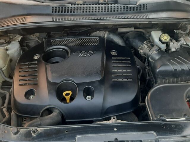 Серый Киа Sportage, объемом двигателя 2 л и пробегом 238 тыс. км за 7800 $, фото 7 на Automoto.ua