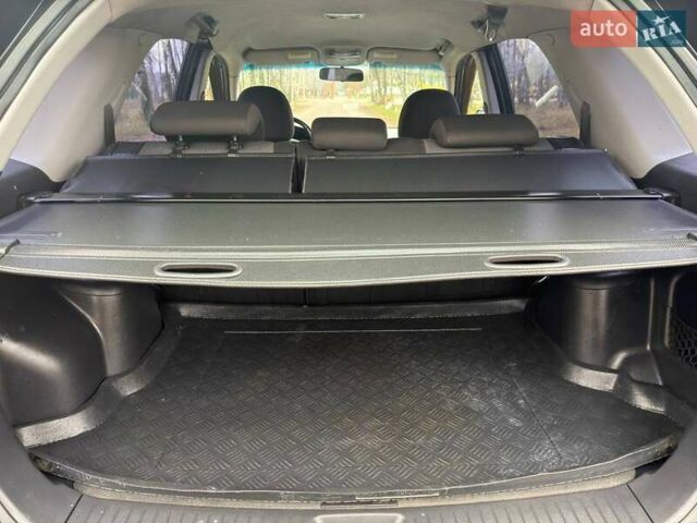 Серый Киа Sportage, объемом двигателя 2 л и пробегом 165 тыс. км за 7490 $, фото 19 на Automoto.ua