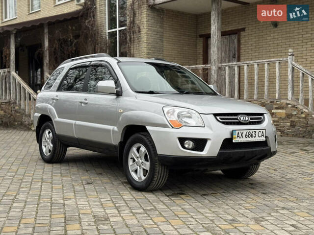 Серый Киа Sportage, объемом двигателя 2 л и пробегом 86 тыс. км за 10200 $, фото 2 на Automoto.ua