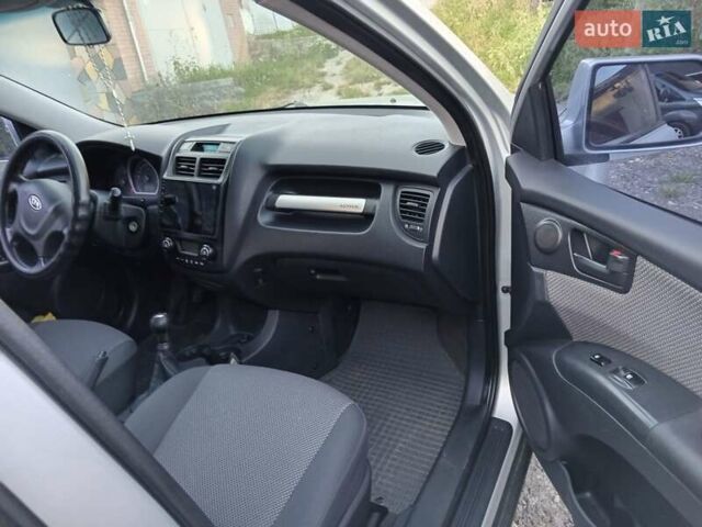 Серый Киа Sportage, объемом двигателя 1.99 л и пробегом 135 тыс. км за 9300 $, фото 31 на Automoto.ua