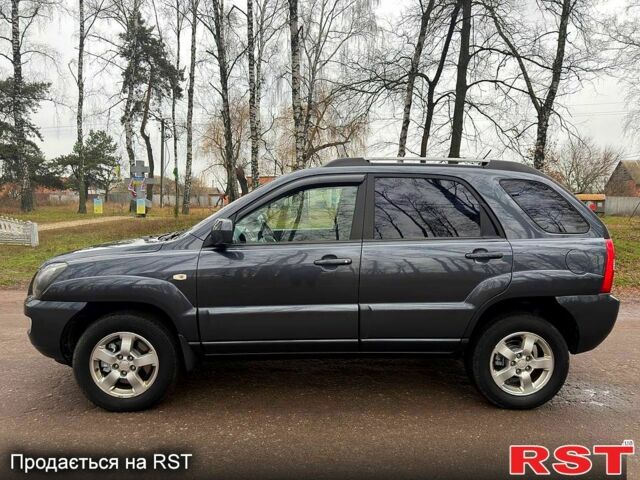 Серый Киа Sportage, объемом двигателя 2 л и пробегом 165 тыс. км за 7490 $, фото 2 на Automoto.ua