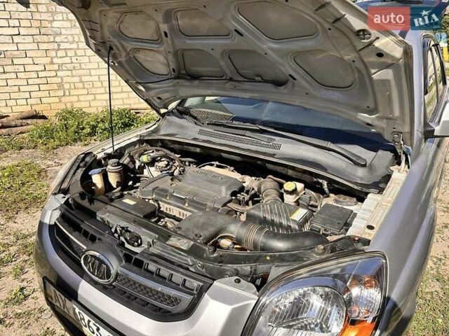 Серый Киа Sportage, объемом двигателя 2 л и пробегом 85 тыс. км за 9689 $, фото 8 на Automoto.ua