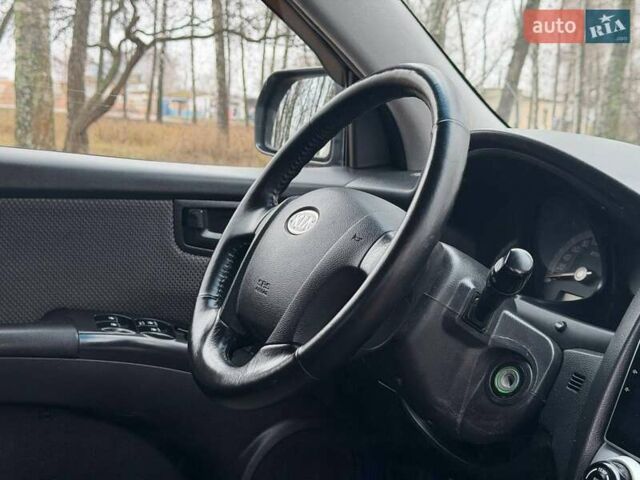 Серый Киа Sportage, объемом двигателя 2 л и пробегом 165 тыс. км за 7490 $, фото 27 на Automoto.ua