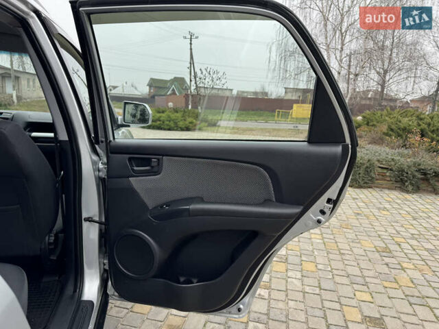 Серый Киа Sportage, объемом двигателя 2 л и пробегом 86 тыс. км за 10200 $, фото 20 на Automoto.ua