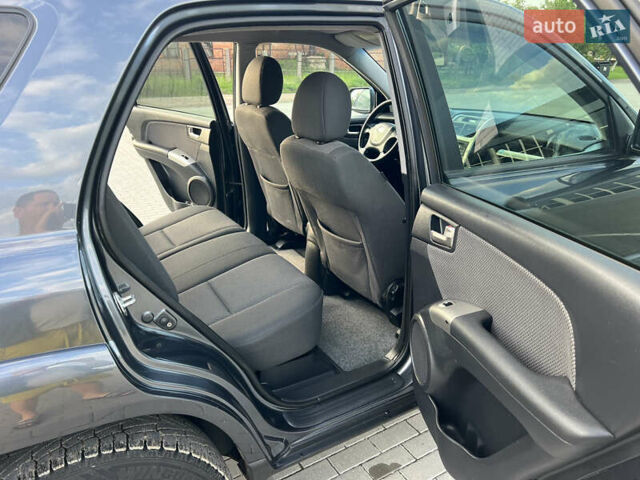 Серый Киа Sportage, объемом двигателя 1.99 л и пробегом 270 тыс. км за 9000 $, фото 25 на Automoto.ua