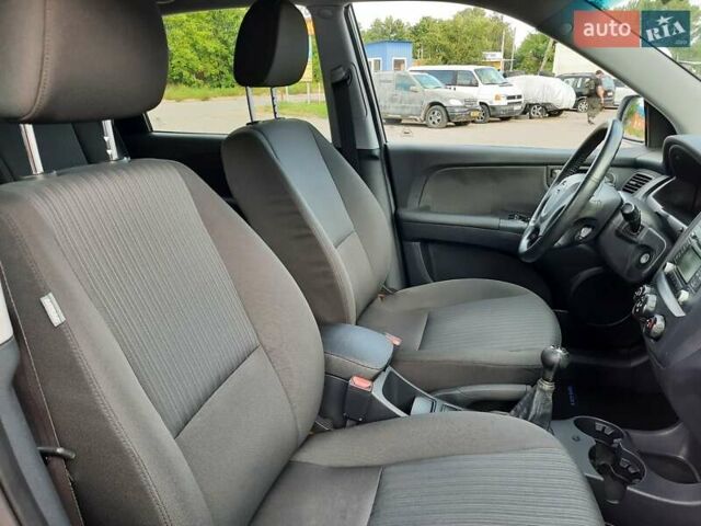 Серый Киа Sportage, объемом двигателя 2 л и пробегом 186 тыс. км за 9100 $, фото 129 на Automoto.ua