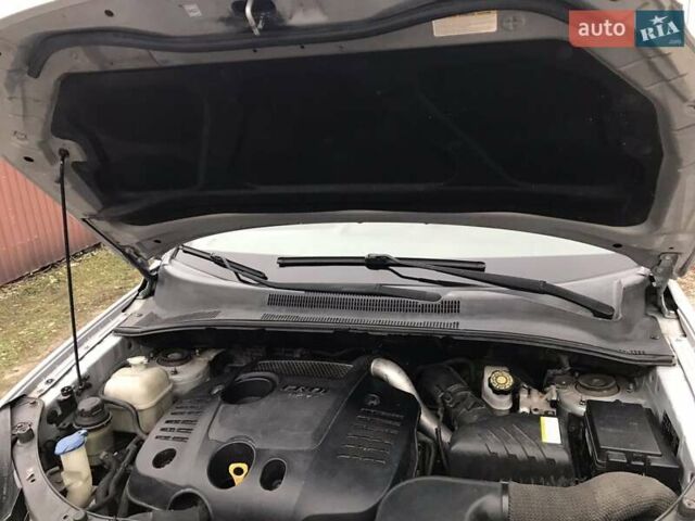Сірий Кіа Sportage, об'ємом двигуна 2 л та пробігом 180 тис. км за 8890 $, фото 3 на Automoto.ua