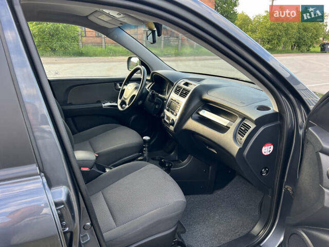 Серый Киа Sportage, объемом двигателя 1.99 л и пробегом 270 тыс. км за 9000 $, фото 21 на Automoto.ua