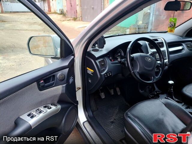 Серый Киа Sportage, объемом двигателя 2 л и пробегом 250 тыс. км за 8250 $, фото 3 на Automoto.ua