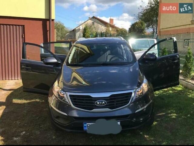 Серый Киа Sportage, объемом двигателя 2 л и пробегом 158 тыс. км за 12000 $, фото 8 на Automoto.ua