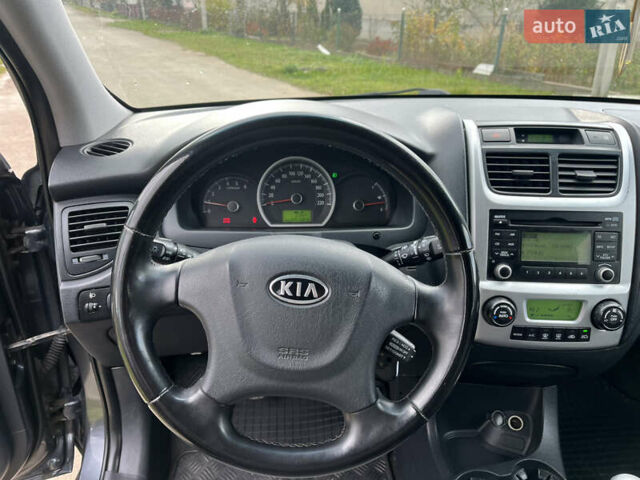 Серый Киа Sportage, объемом двигателя 1.99 л и пробегом 241 тыс. км за 8650 $, фото 16 на Automoto.ua