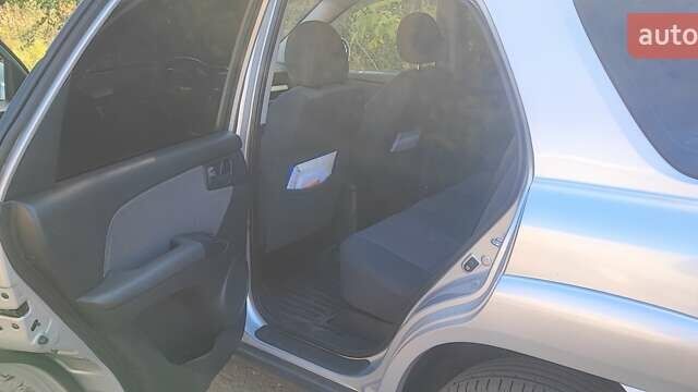 Сірий Кіа Sportage, об'ємом двигуна 1.98 л та пробігом 163 тис. км за 9400 $, фото 8 на Automoto.ua