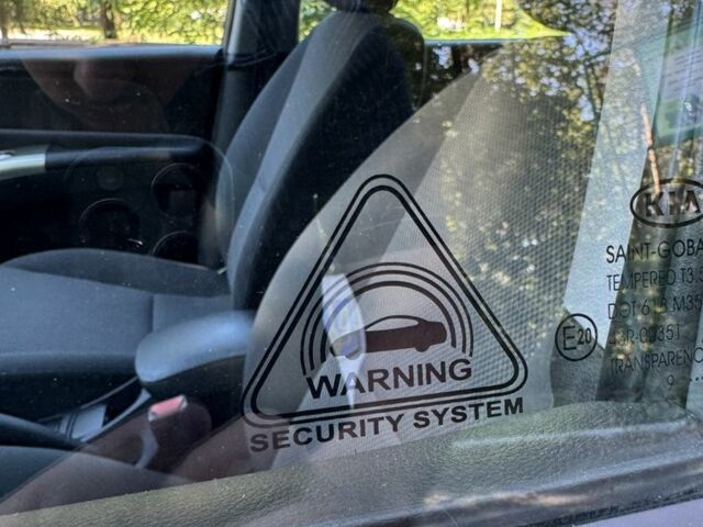 Серый Киа Sportage, объемом двигателя 2 л и пробегом 206 тыс. км за 8900 $, фото 14 на Automoto.ua