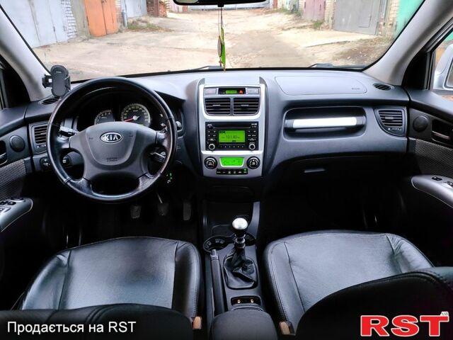 Серый Киа Sportage, объемом двигателя 2 л и пробегом 250 тыс. км за 8250 $, фото 5 на Automoto.ua