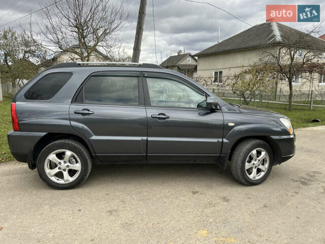 Серый Киа Sportage, объемом двигателя 1.99 л и пробегом 241 тыс. км за 8650 $, фото 4 на Automoto.ua