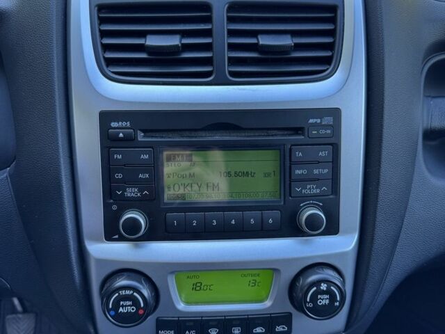 Серый Киа Sportage, объемом двигателя 2 л и пробегом 206 тыс. км за 8900 $, фото 13 на Automoto.ua