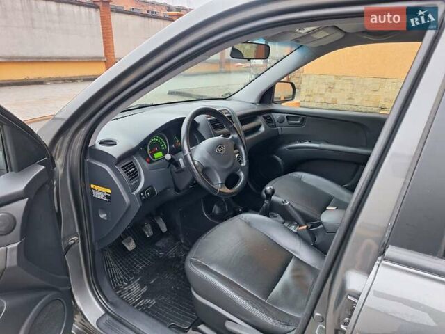 Серый Киа Sportage, объемом двигателя 2 л и пробегом 162 тыс. км за 8350 $, фото 14 на Automoto.ua